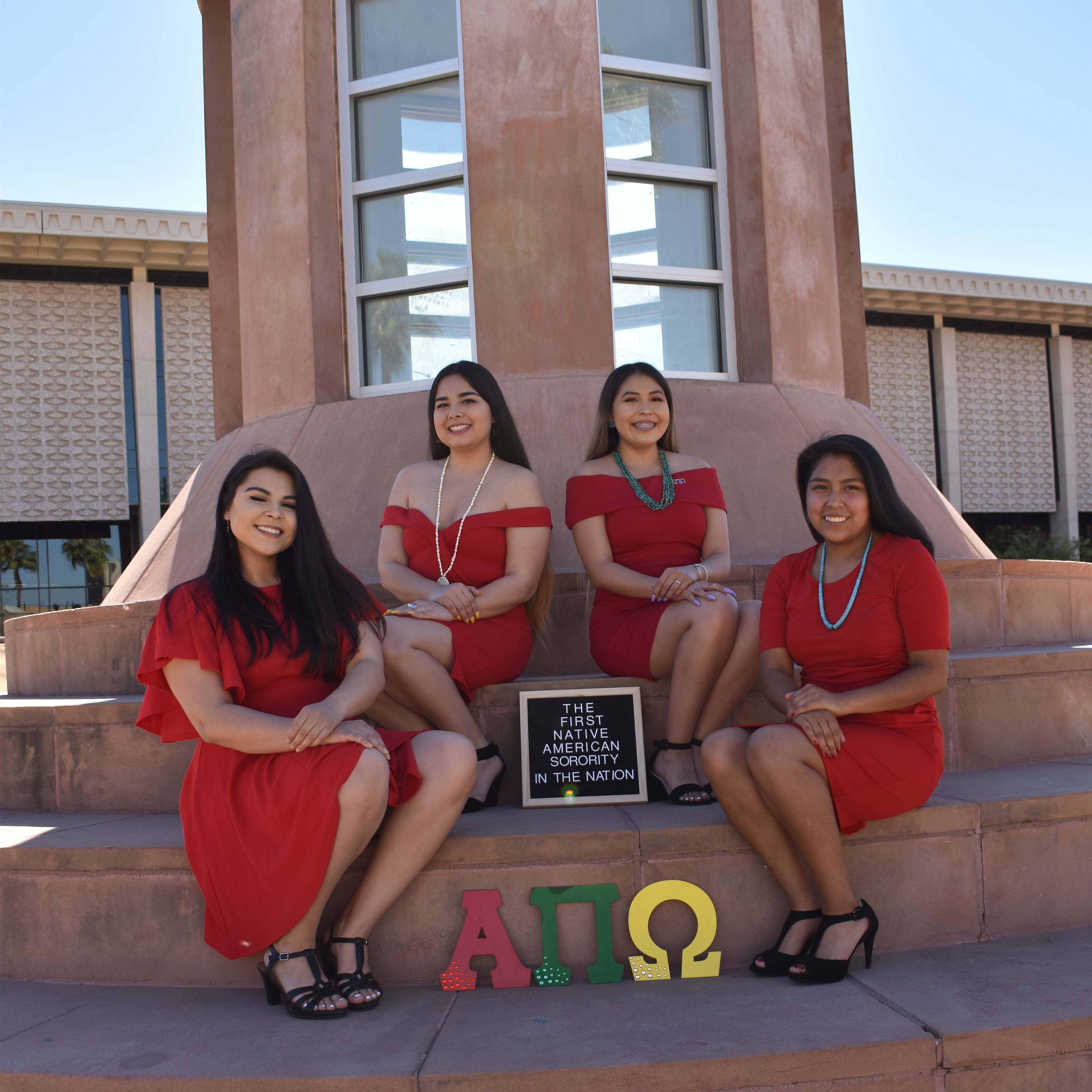 Native ASU sorority sisters pose at Hayden Library at ASU's Tempe campus