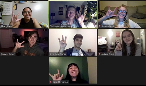 ASU students using ASL signs for forks up and I love you in a Zoom grid