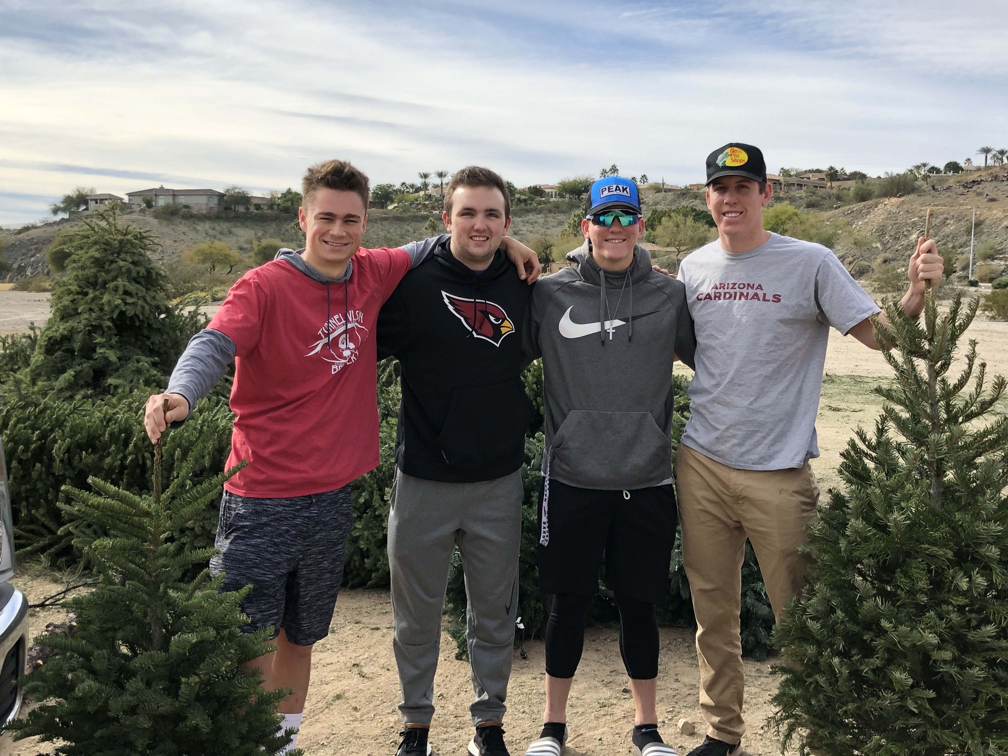 Left to right: Connor Hogan, Morgan Taylor, Cole Newgaard and Dillon Newgaard of Ahwatukee Christmas tree removal