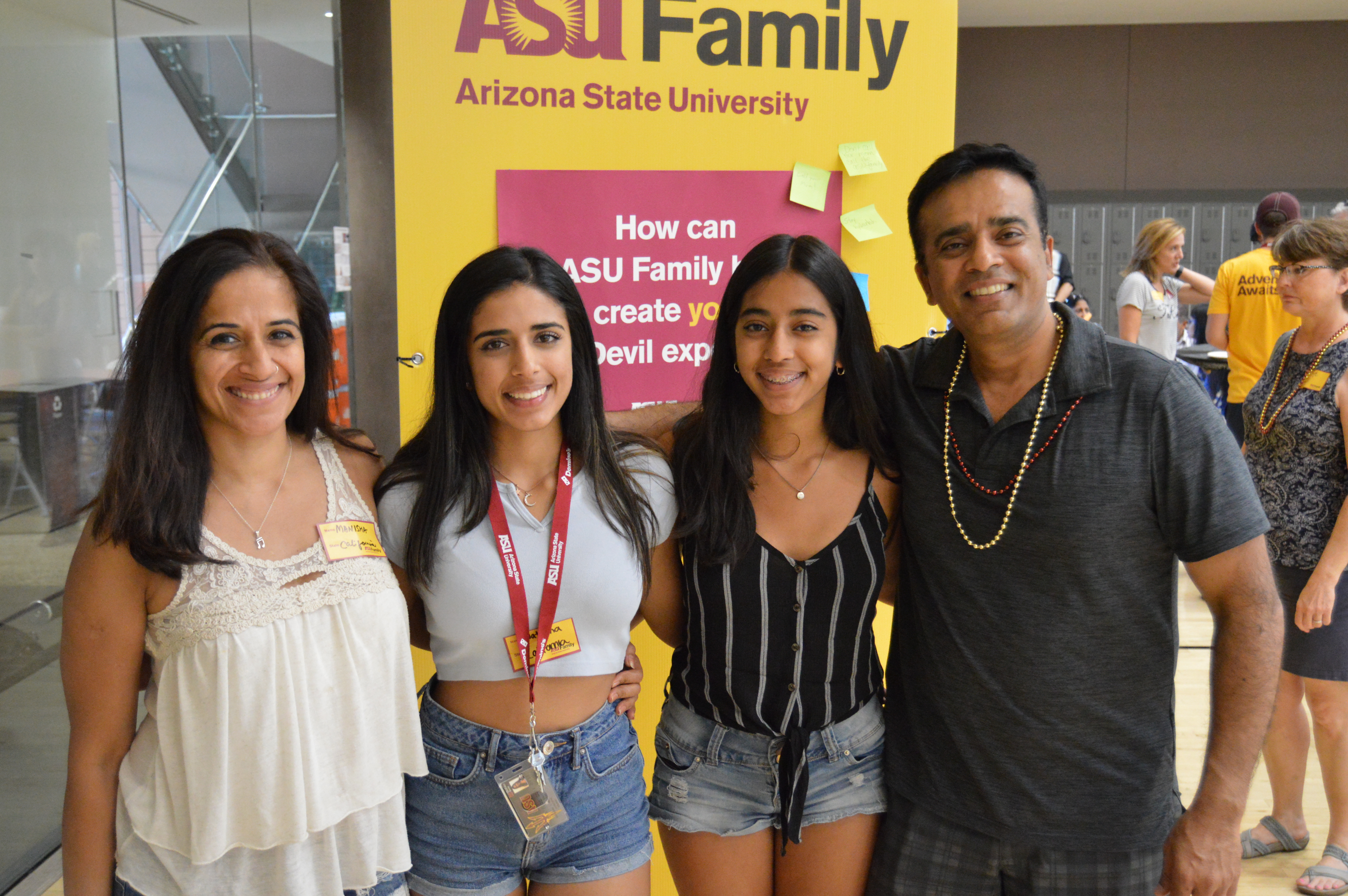 Four family members pose at an ASU Family welcome event