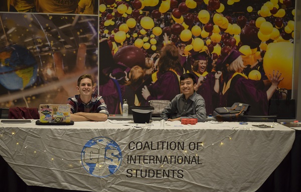 Coalition of International Students students at a table at ASU's Student Pavilion
