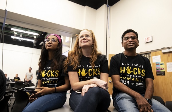 Alleyway co-creators Sanjana Saurin Shah, Molly Luther and Sidharth Ughade await the judges' decisions at Hacks for Humanity 2019. Photo by Alisa Reznick)