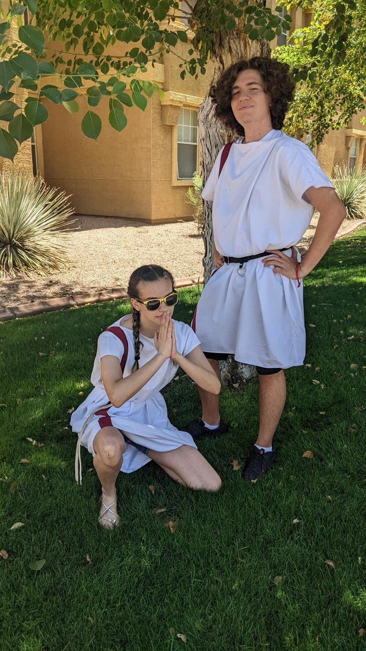 students in period-appropriate tunics