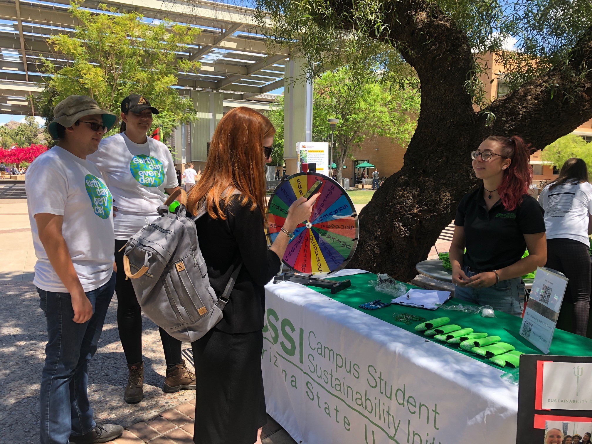 The Campus Student Sustainability Initiative works at a tabling event on the tempe campus.